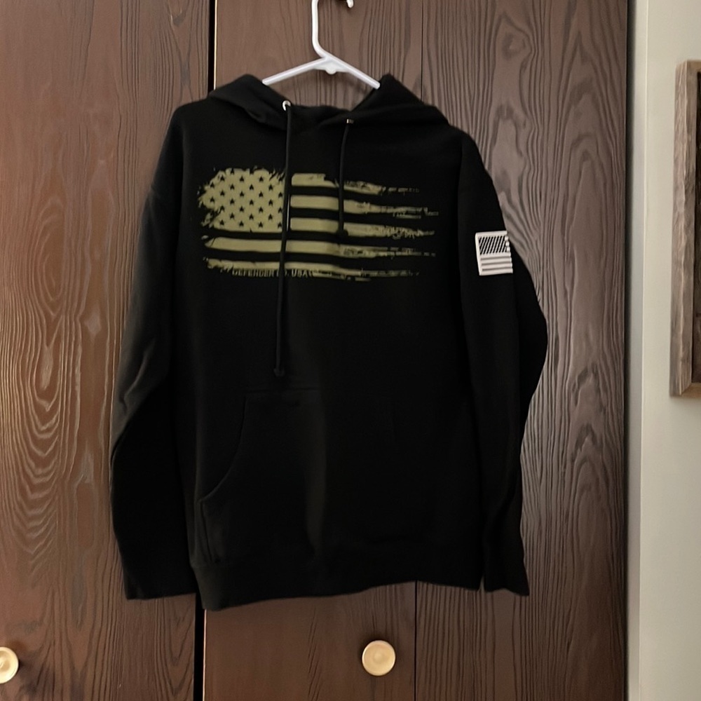 Defender Company heavyweight, hooded black sweatshirt. Designed in front. Size M